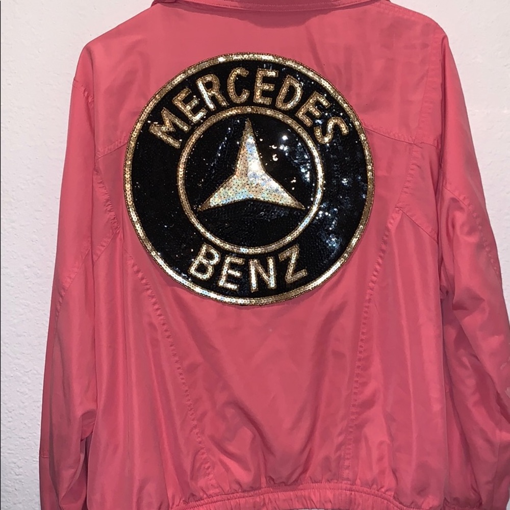 Pink Jacket with Logo Sticker- Used